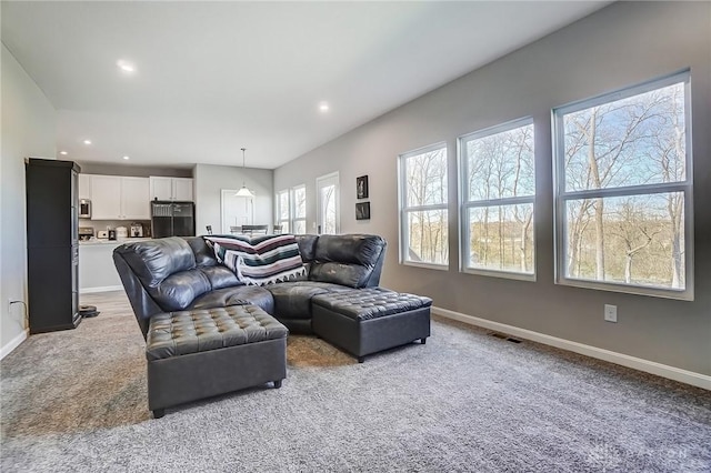 1629 Arden Bnd, Fairborn, OH 45324 - living area featuring light carpet, baseboards, and recessed lighting
