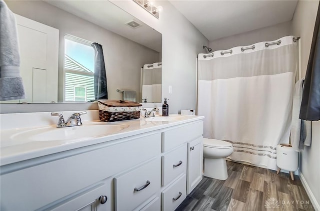 1629 Arden Bnd, Fairborn, OH 45324 - full bath with a sink, visible vents, toilet, and double vanity