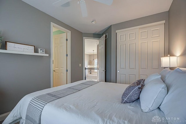 bedroom with a closet and a ceiling fan
