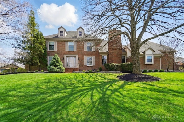 1458 Westwicke Pl, Washington Twp, OH 45459 - view of front of home with brick siding and a front lawn