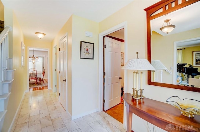 1458 Westwicke Pl, Washington Twp, OH 45459 - hall with a notable chandelier and baseboards