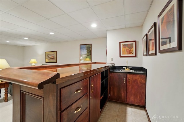 1458 Westwicke Pl, Washington Twp, OH 45459 - bar with light tile patterned floors, indoor wet bar, a sink, recessed lighting, and a drop ceiling