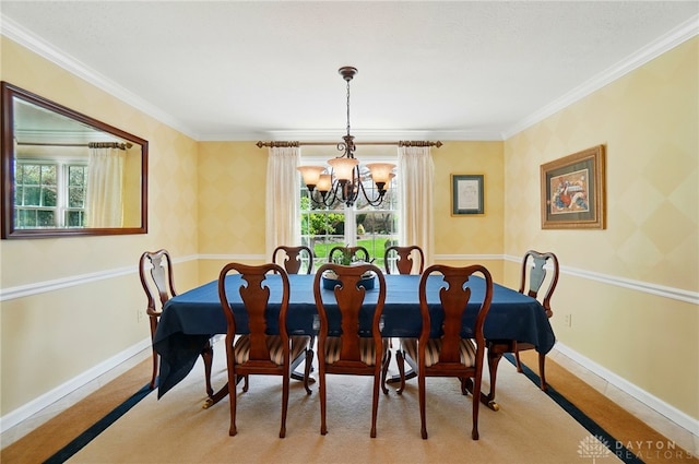 1458 Westwicke Pl, Washington Twp, OH 45459 - dining space with crown molding, baseboards, a notable chandelier, and wallpapered walls