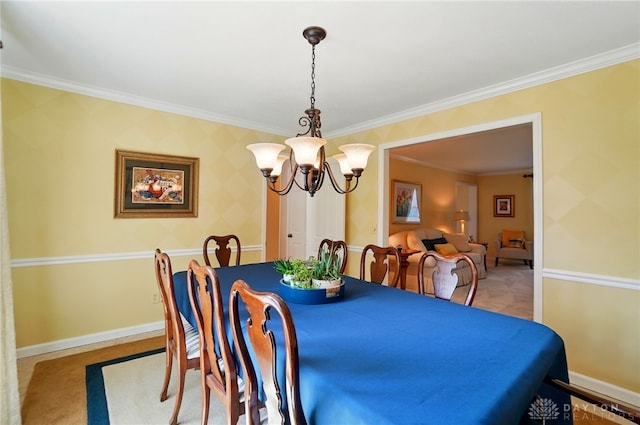 1458 Westwicke Pl, Washington Twp, OH 45459 - dining room with crown molding, baseboards, and an inviting chandelier