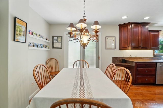 1458 Westwicke Pl, Washington Twp, OH 45459 - dining room featuring recessed lighting, light wood-style flooring, and an inviting chandelier