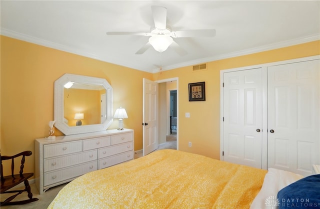 1458 Westwicke Pl, Washington Twp, OH 45459 - carpeted bedroom featuring ornamental molding, visible vents, ceiling fan, and a closet
