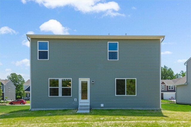 1226 Heathgate Way, Fairborn, OH 45324 - rear view of house with entry steps and a yard