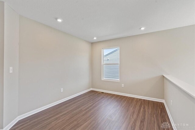 1226 Heathgate Way, Fairborn, OH 45324 - empty room with wood finished floors and recessed lighting