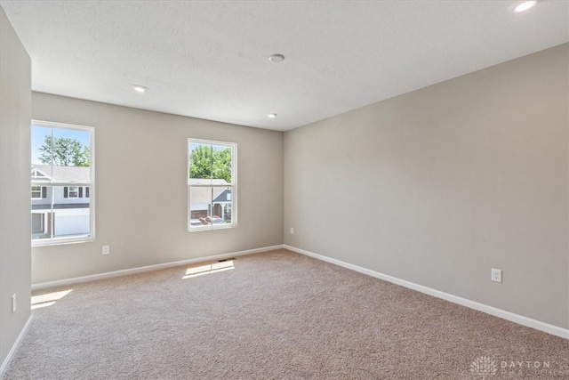 1226 Heathgate Way, Fairborn, OH 45324 - empty room featuring carpet, healthy amount of natural light, and recessed lighting