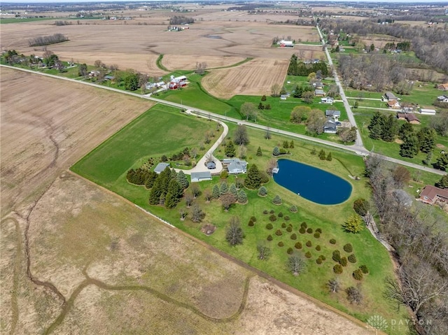 bird's eye view featuring a water view and a rural view