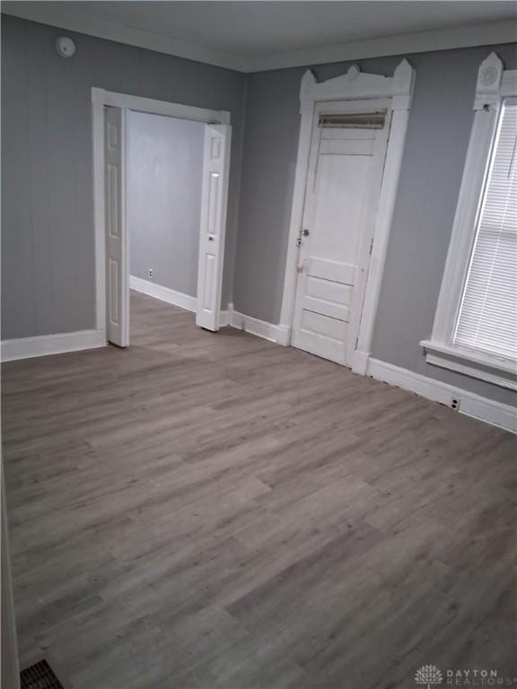 217 Fillmore St, Dayton, OH 45410 - empty room featuring wood finished floors, baseboards, and a smoke detector
