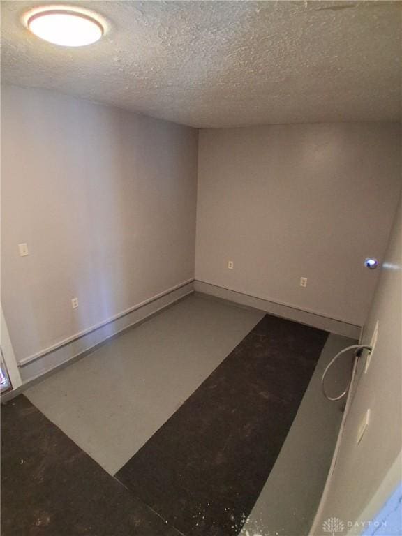 217 Fillmore St, Dayton, OH 45410 - unfurnished room featuring a textured ceiling