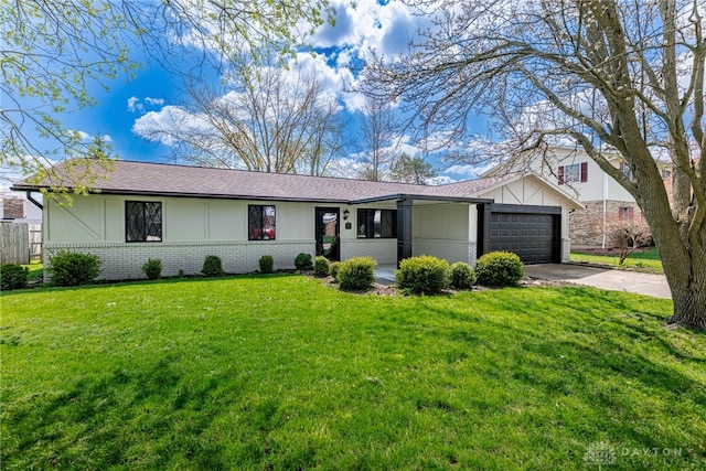 1917 Beckert Dr, Piqua, OH 45356 - view of front of property featuring brick siding, concrete driveway, an attached garage, a front yard, and a shingled roof