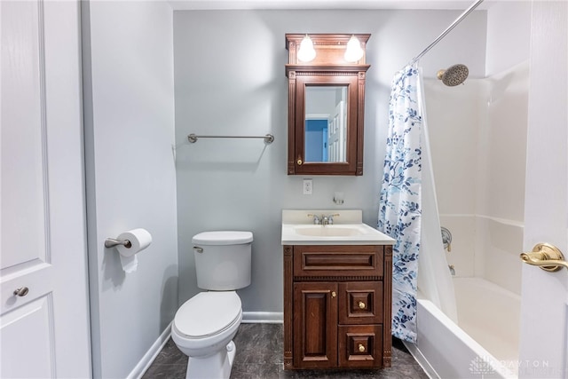 1917 Beckert Dr, Piqua, OH 45356 - full bathroom with toilet, baseboards, vanity, and shower / bath combo with shower curtain