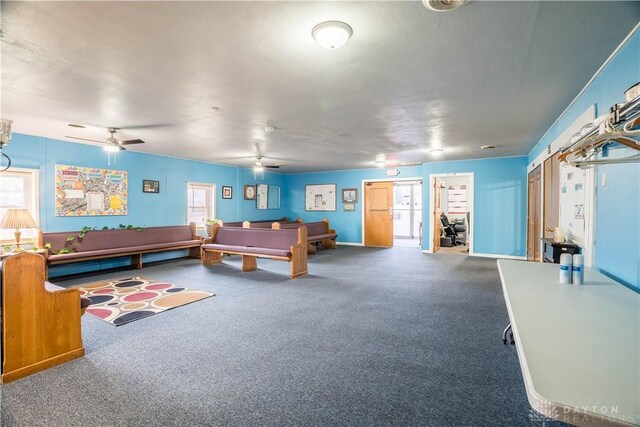 7045 US-40, New Carlisle, OH 45344 - game room with carpet flooring, plenty of natural light, and a ceiling fan