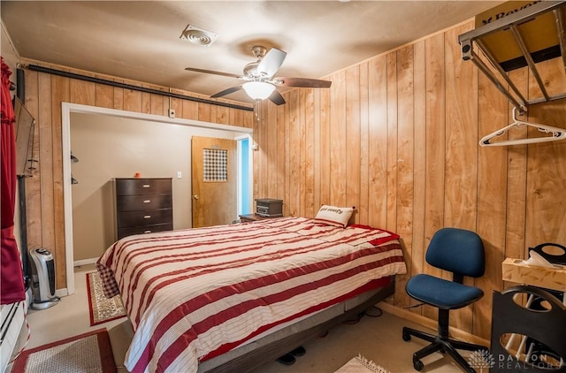 7045 US-40, New Carlisle, OH 45344 - bedroom with wooden walls and carpet flooring