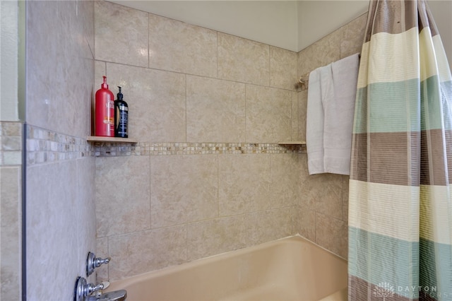 full bathroom featuring shower / bathtub combination with curtain