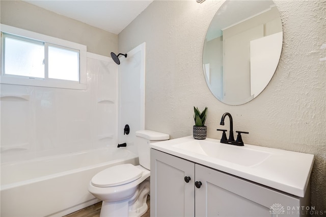 full bath featuring toilet, a textured wall, and  shower combination
