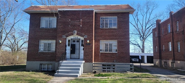view of front of property with brick siding