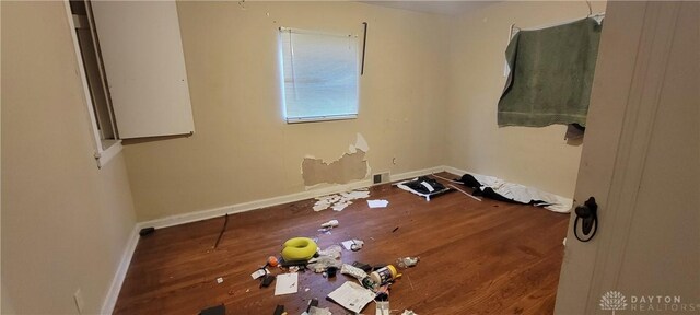 710 Rockford Ave Unit 704, Dayton, OH 45405 - spare room featuring baseboards, visible vents, and wood finished floors