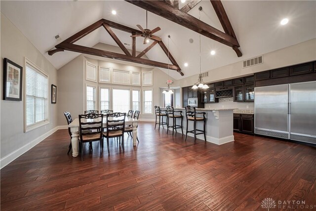 1198 Normandy Rue, Springboro, OH 45458 - dining area with dark wood-type flooring, visible vents, beam ceiling, high vaulted ceiling, and ceiling fan with notable chandelier