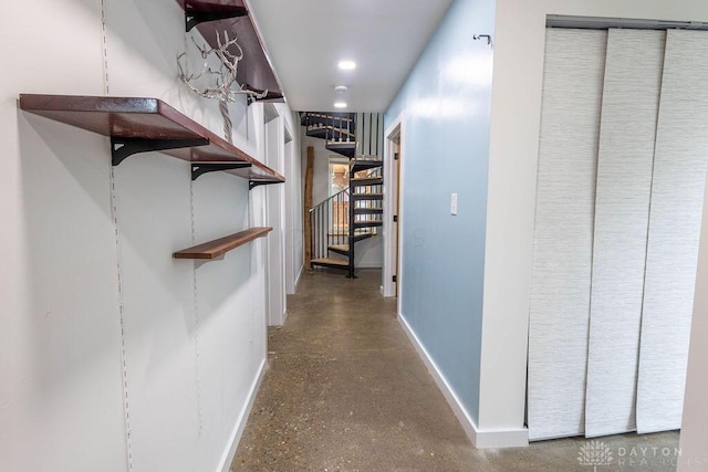 corridor with stairs and baseboards