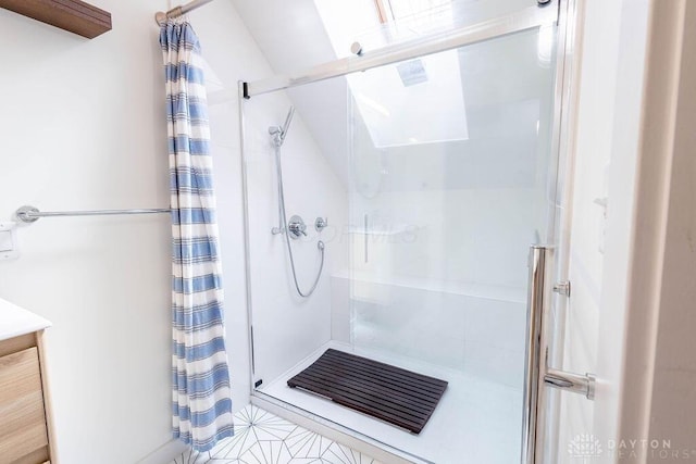 full bath featuring a stall shower