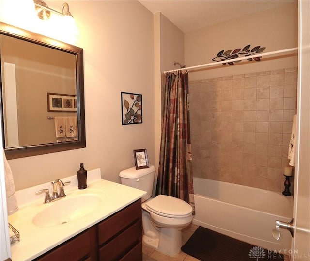 full bathroom with shower / bath combo, toilet, vanity, and tile patterned floors