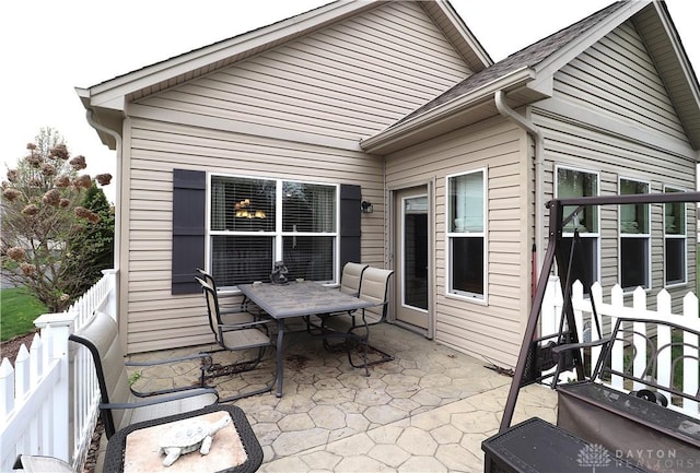 view of patio featuring fence private yard and outdoor dining space