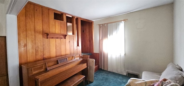 305 S Ada Doty St, Gratis, OH 45330 - living area with dark carpet and wooden walls