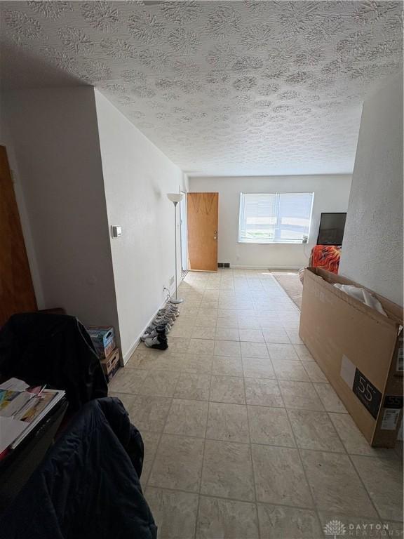 349 Orchard Dr, Oakwood, OH 45419 - hall featuring a textured ceiling