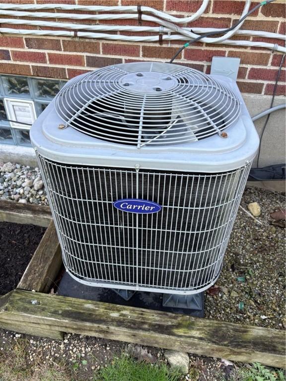 349 Orchard Dr, Oakwood, OH 45419 - details featuring central AC unit