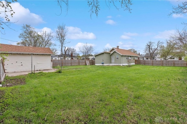 view of yard featuring a fenced backyard