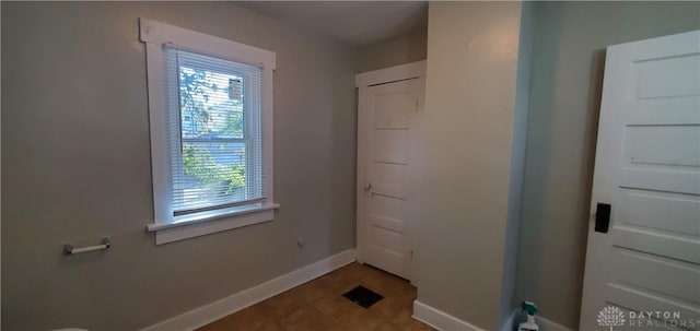 606 Creighton Ave, Dayton, OH 45410 - doorway with baseboards, visible vents, and plenty of natural light