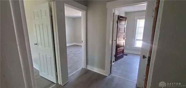 606 Creighton Ave, Dayton, OH 45410 - corridor featuring baseboards and dark wood-style flooring