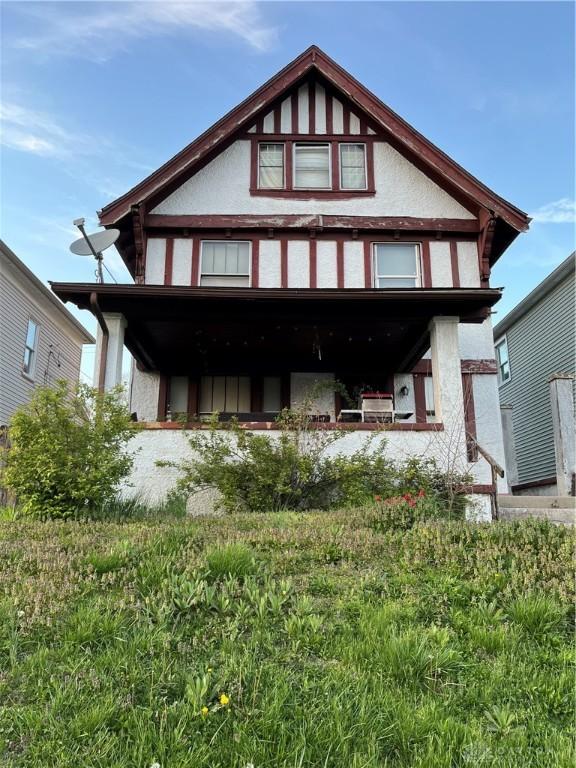 1049 Wyoming St, Dayton, OH 45410 - rear view of property featuring stucco siding