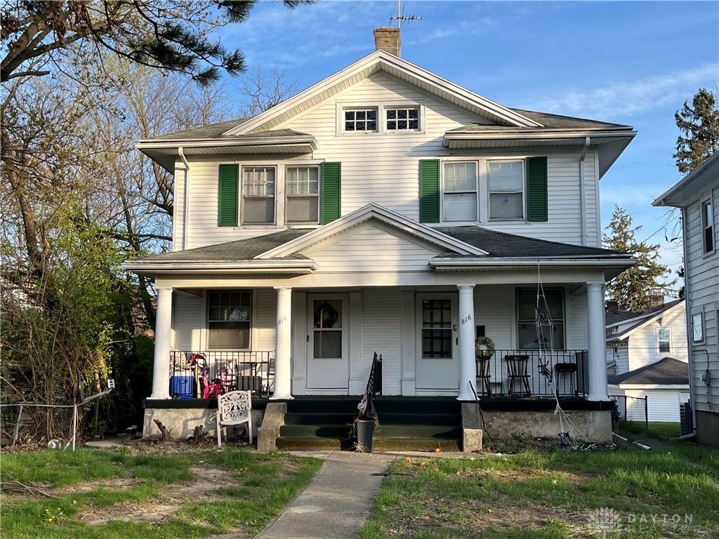 814-816 Cornell Dr, Dayton, OH 45406 - view of front of property featuring a chimney and covered porch