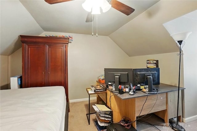 bedroom with baseboards, lofted ceiling, and light carpet