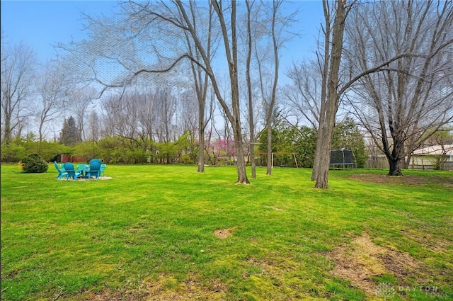 view of yard featuring a trampoline