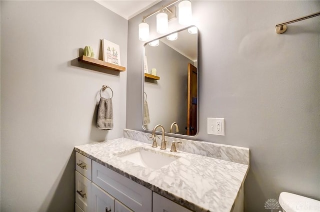 half bath with toilet and vanity