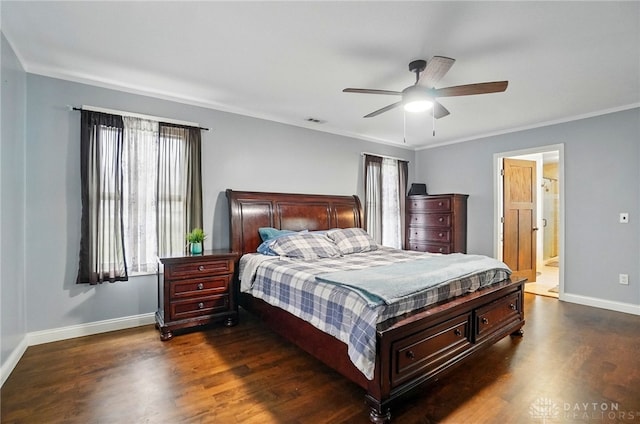 bedroom featuring visible vents, baseboards, ceiling fan, dark wood-type flooring, and ornamental molding