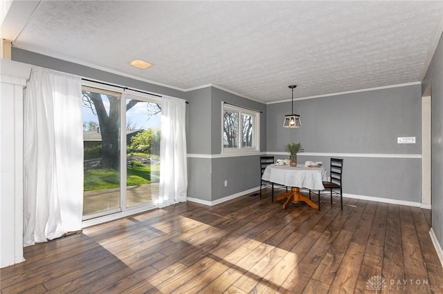 330 Rumson St, Englewood, OH 45322 - dining room with wood-type flooring, a textured ceiling, and baseboards