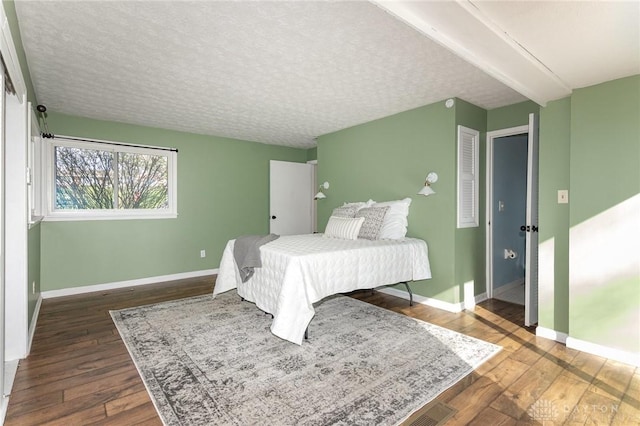 330 Rumson St, Englewood, OH 45322 - bedroom with wood finished floors, baseboards, and a textured ceiling