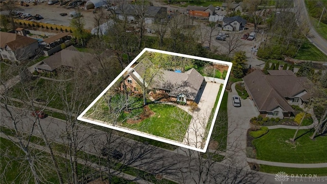 birds eye view of property with a residential view