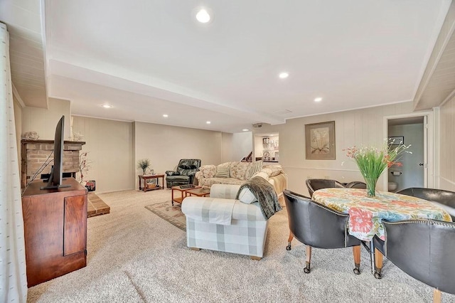 living room with carpet floors, recessed lighting, and crown molding