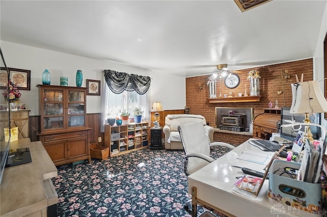 office with brick wall, carpet flooring, and visible vents
