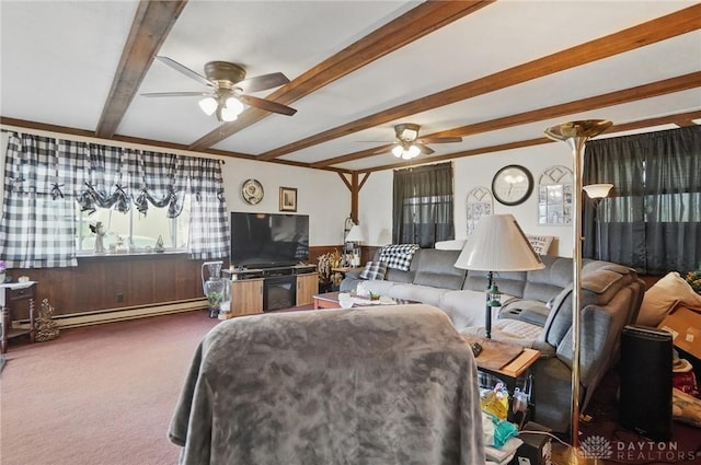 living area with a baseboard radiator, carpet flooring, beam ceiling, and a ceiling fan
