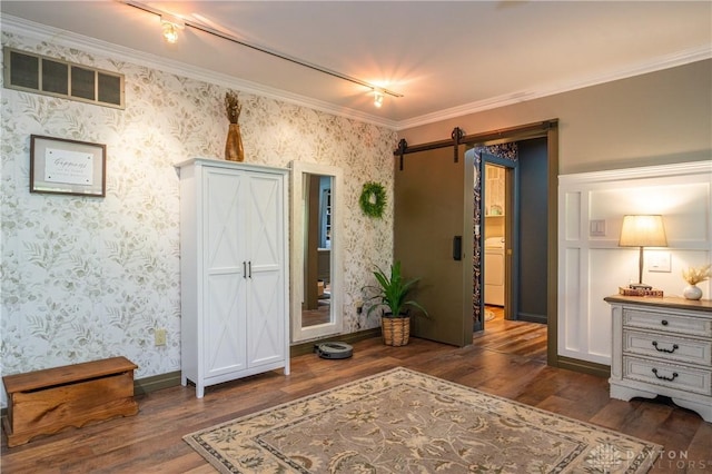 6475 Landsend Ct, Butler Township, OH 45414 - interior space featuring a barn door, visible vents, washer / dryer, crown molding, and dark wood-style flooring