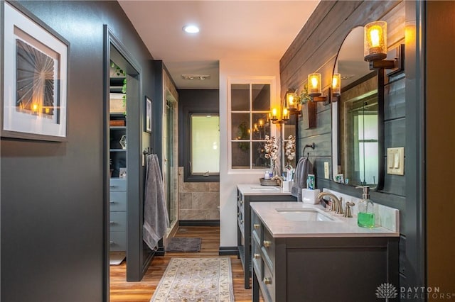 6475 Landsend Ct, Butler Township, OH 45414 - full bath with vanity, wood finished floors, and a shower