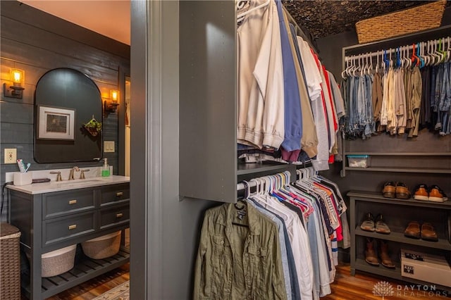 6475 Landsend Ct, Butler Township, OH 45414 - spacious closet with wood finished floors and a sink